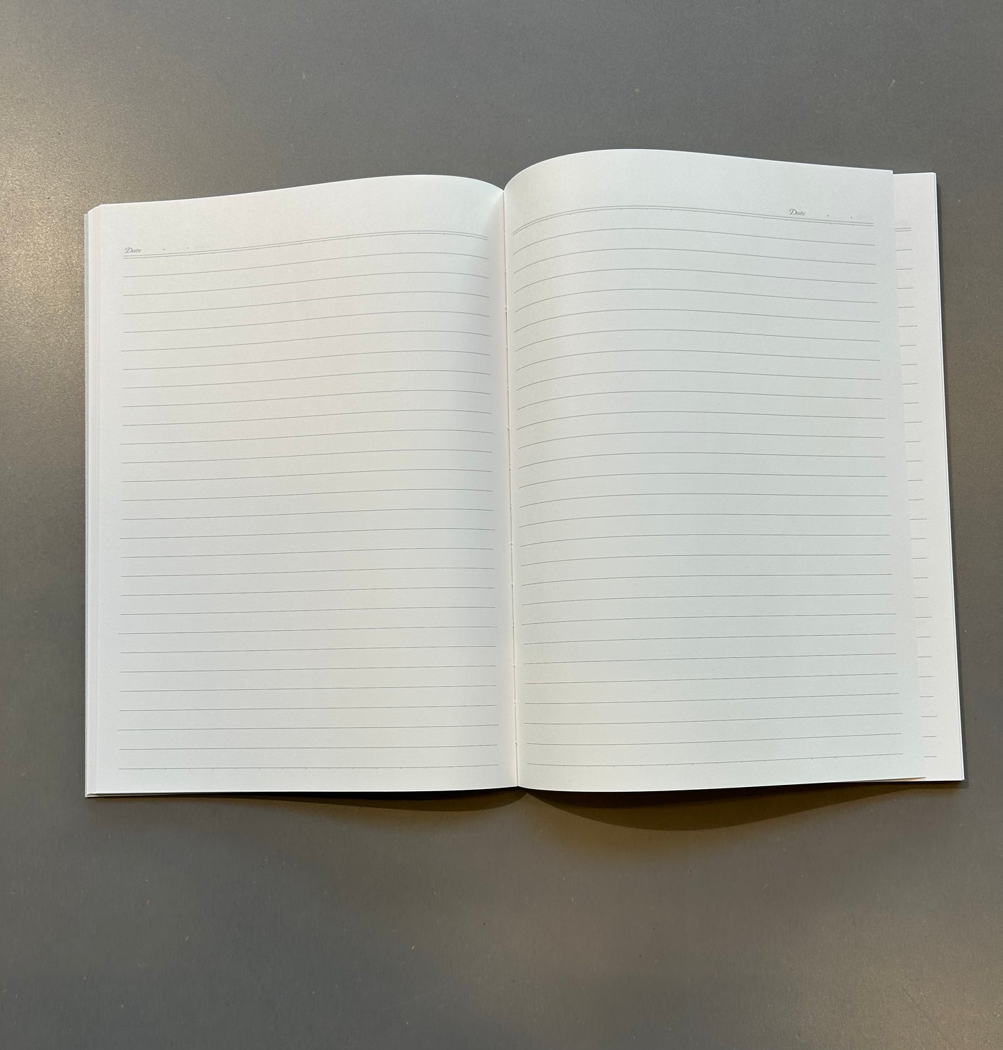Apica Personal notebook opengeslagen, gelinieerd 8 mm