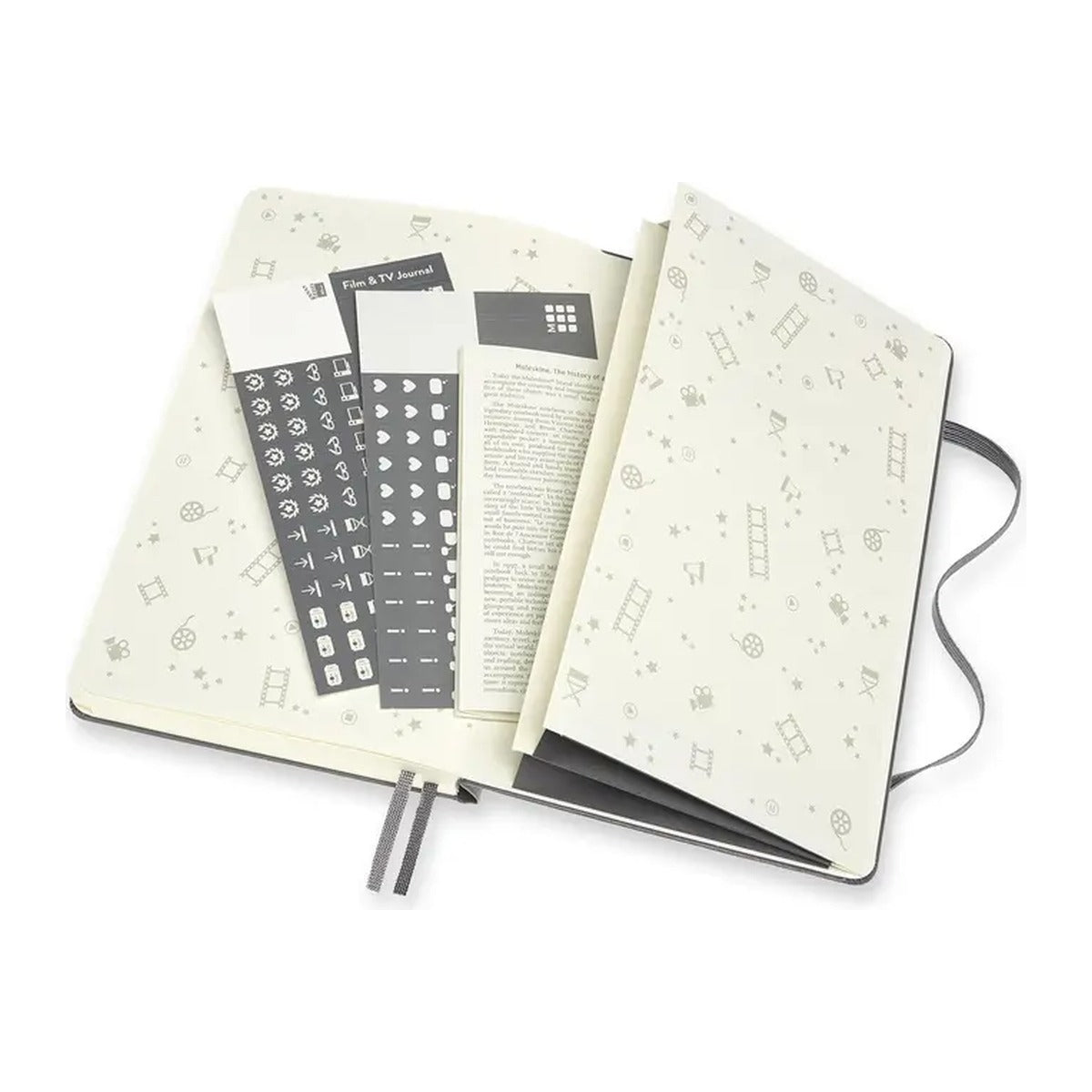 Opengeslagen Moleskine Film & TV Journal met stickervellen en uitvouwbare pagina